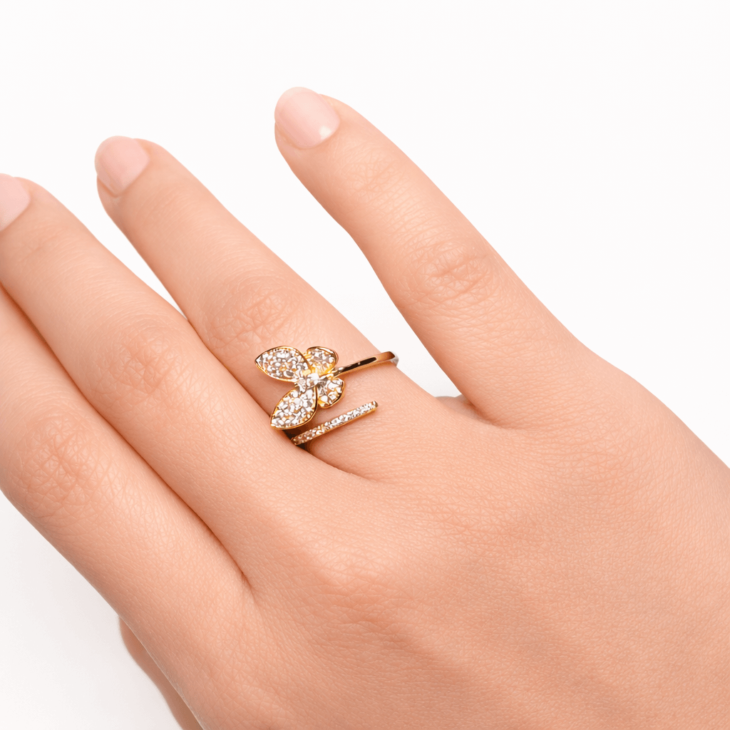 gold butterfly ring with white stones