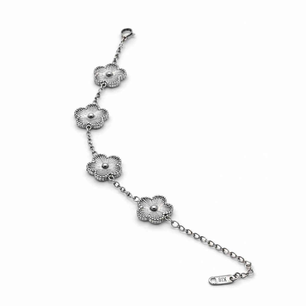 Silver floral bracelet on a white background