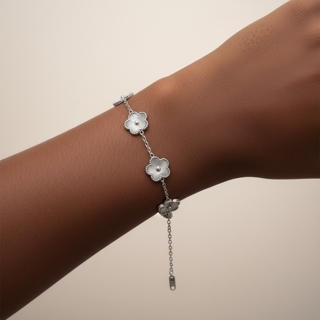 Silver floral bracelet on a white background